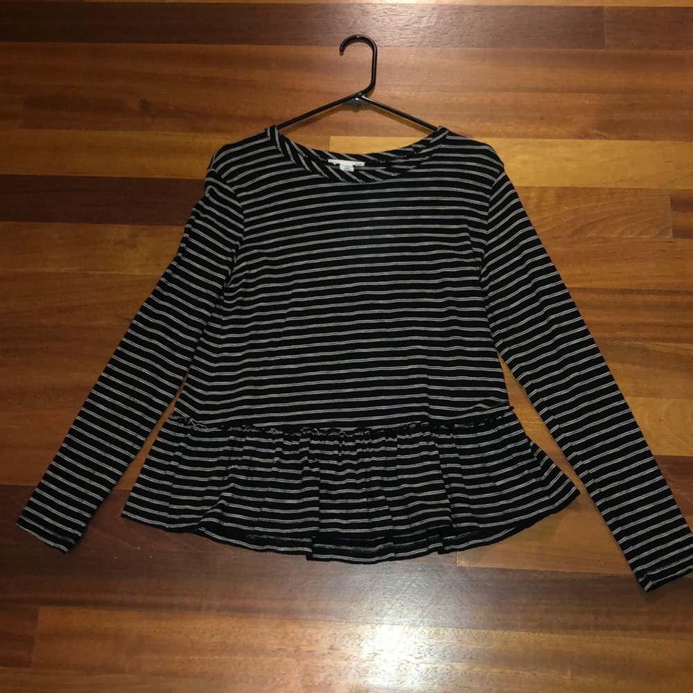 Long sleeve black and white striped flare top.